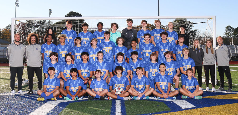 Group photo of the Oxford Charger Soccer team and coaches