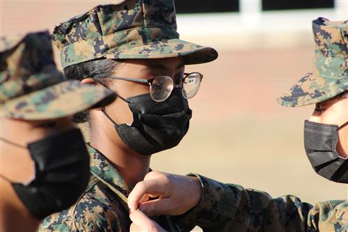Cadet Corporal Ashanti Martin promotes  Private First Class to Lance CorporalAliciya Howard  